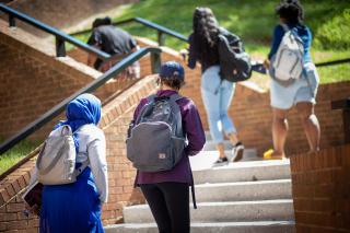 students walking upstairs