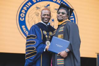 President Anthony L. Jenkins with a 2024 Graduate